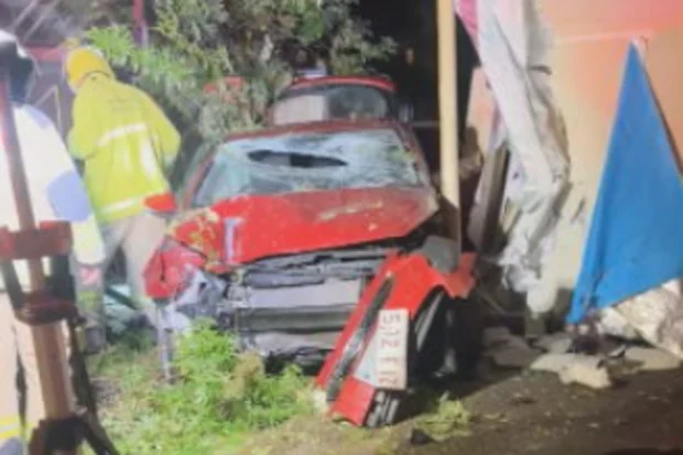 Three girls injured after stolen car ploughs into South Brisbane home