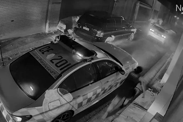Woman arrested two fugitives sought after dramatic Sydney police chase